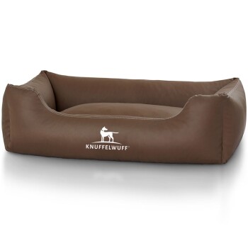 Braunes Hundebett mit hohen Seiten und einem weißen 'KNUFFELWUFFF'-Logo auf der Vorderseite.