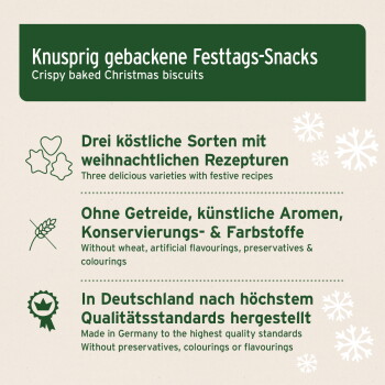 Verpackung von knusprigen gebackenen Weihnachtsplätzchen in Deutsch und Englisch, die drei festliche Sorten zeigt, glutenfrei und von hoher Qualität.