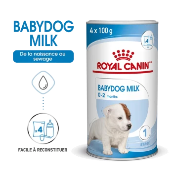 Emballage de lait Royal Canin Babydog, contenant 4 x 100g de boîtes, adapté pour les chiots de 0 à 2 mois, avec des instructions pour la reconstitution.