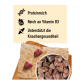 DIBO Kopffleisch Hundefutter, das sieben 2000g Beutel zeigt, als ausgewogene und gesunde Ernährung für Hunde gekennzeichnet, mit Fokus auf vitaler Knochengesundheit.