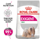 Torba karmy dla psów Royal Canin Exigent Mini z ilustracją puszystego psa, z tekstem 'Zaspokaja wybredny apetyt' i '99% psów'.