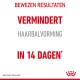 Tekst op een witte achtergrond die zegt "BEWEZEN RESULTATEN VERMINDEERT HAARBALVORMING IN 14 DAGEN*" met een rood logo onderaan.