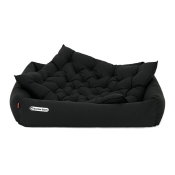Schwarzes Hundebett mit gepolstertem Design und zusätzlichem Kissen, mit dem Logo "Doctor Bark" an der Seite.