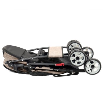 Ein zusammengeklappter Haustierwagen mit einem beigen Stoffsitz und schwarzem Rahmen, der drei silberne Räder und einen roten Verschluss für einfache Lagerung hat.