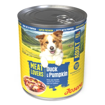 Dose Josera 'Meat Lovers' Hundefutter, 'Duck with Pumpkin' (Adult, grain‑free) mit lachendem Hund auf dem Etikett.