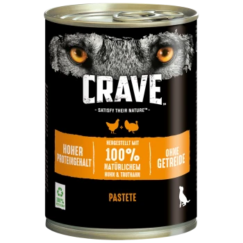 Dosen-Hundefutter mit dem Etikett "CRAVE", das das Gesicht eines Wolfes zeigt, mit dem Fokus auf hohem Protein, 100% natürlichem Huhn und Truthahn sowie getreidefrei.