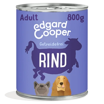 Edgard & Cooper Adult getreidefreie Rindfleisch-Hundenahrung Dose, 800g, mit Cartoon-Kuh- und Hundillustrationen auf lila Etikett.