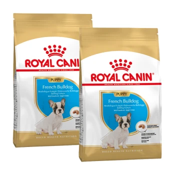 Zwei Tüten Royal Canin Welpenfutter für Französische Bulldoggen, mit einem Bild eines Welpen auf der Vorderseite und Text, der rassespezifische Ernährung beschreibt.