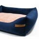 Marineblaues Haustierbett mit weichem rosa Zentrum und erhöhten Rändern, mit einem Lederschild, auf dem 'REXPRODUCT.COM' steht.