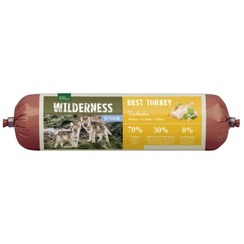 Huisdiervoeding verpakking voor "Wilderness Junior Best Turkey" met twee wolfpuppies, met 70% kalkoen en 30% planten, zonder toegevoegde granen.