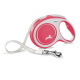 A pink retractable dog leash with a white handle and a silver clip, featuring a silhouette of a running dog and the text "MADE IN GERMANY."