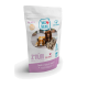 Pochette de snack tendre Swiss Natural Z'Nüni 60% poulet montrant deux chiens, des croquettes et le texte « Sentez-le. Goûtez-le. Aimez-le ! ».