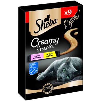 Boîte de friandises pour chats Sheba Creamy Snacks avec un chat gris aux yeux verts, contenant 9 sachets de saveurs saumon et poulet.