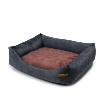 Ein plüschiges Haustierbett mit einem dunkelgrauen Äußeren und einem weichen braunen Inneren, das für Komfort und Stil entworfen wurde.