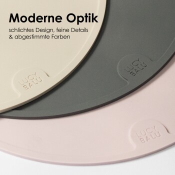 Drei Futtermatten für Haustiere in modernen Farben (beige, grau, rosa) mit dem Text 'Moderne Optik' und 'LUCY BALU' eingeprägt.
