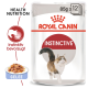 Royal Canin Instinctive Katzenfutterbeutel, 85g x 12, mit einer Illustration einer rennenden Katze, mit dem Text 'Health Nutrition' und 'Gelee'.