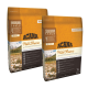 Zwei Säcke ACANA Wild Prairie Hundefutter vor einer Berg- und Blumenlandschaft, die Zutaten und ernährungsphysiologische Vorteile zeigt.