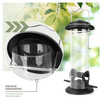 Vogelfutterspender mit einem klaren zylindrischen Design und schwarzen Akzenten, mit einem Etikett, das 'EINFACHE HANDHABUNG - Schnell & sicher verschließbar.' liest.