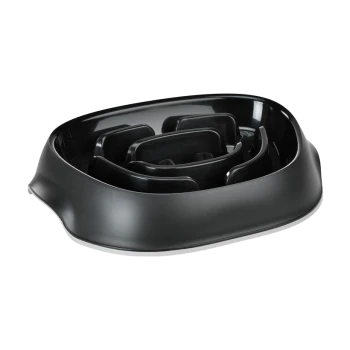 Bol de nourriture pour animaux noir avec un design intérieur en labyrinthe pour ralentir l'alimentation, avec un extérieur lisse et arrondi.