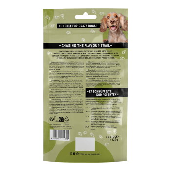 Rückseite einer Tierleckerlipackung, die einen lächelnden Hund zeigt und Text über "Den Geschmackspfad verfolgen" mit Zutaten- und Nährwertangaben.